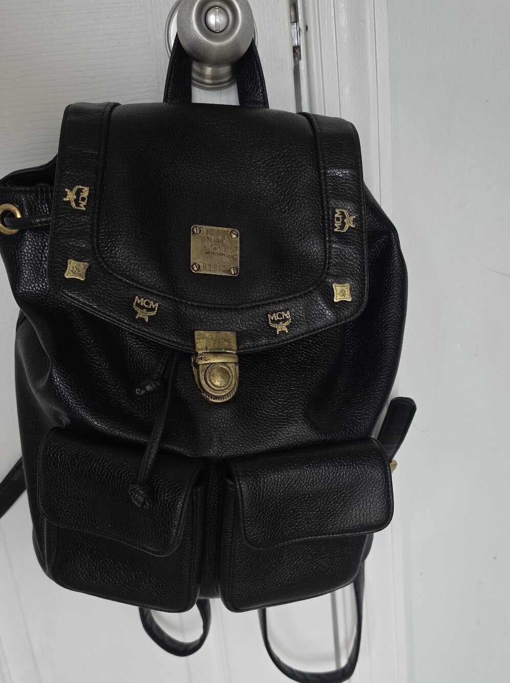 MCM Vintage Black Pebbled Leather Mini Backpack with Gold Accents